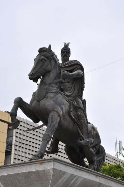 From Skopje:Day Trip to Pristina,Bear Sanctuary&Gadime Cave - Pristina Walking Tour: Newborn Monument, Mother Teresa Square, and Ottoman Corners