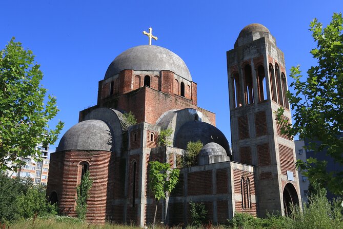 Private Walking Tour from Mother Theresa Cathedral in Pristina - National Library of Kosovo, Pjetër Bogdani: the domes you notice first