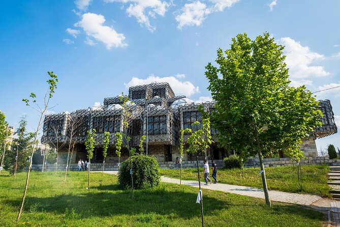 The best of Pristina walking tour - Mother Teresa statue in the main square, plus the Bill Clinton and National Library stories